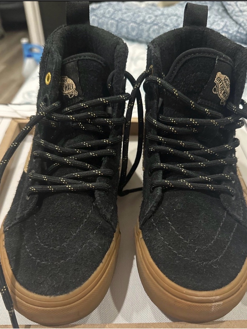 Vans Black High-Top Sneakers with Gum Outsole and Gold Accents